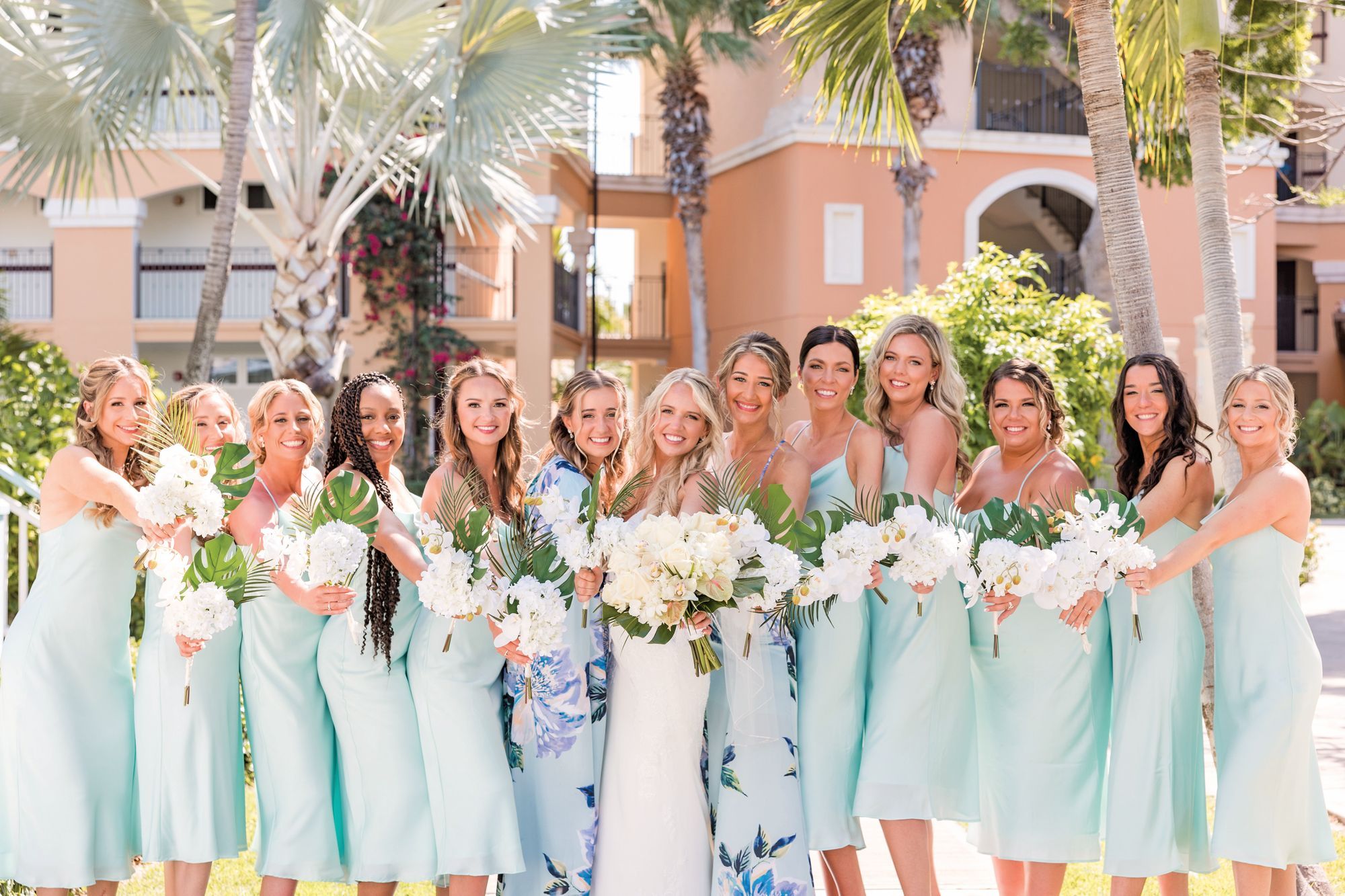 bride and bridesmaids holding bouqets