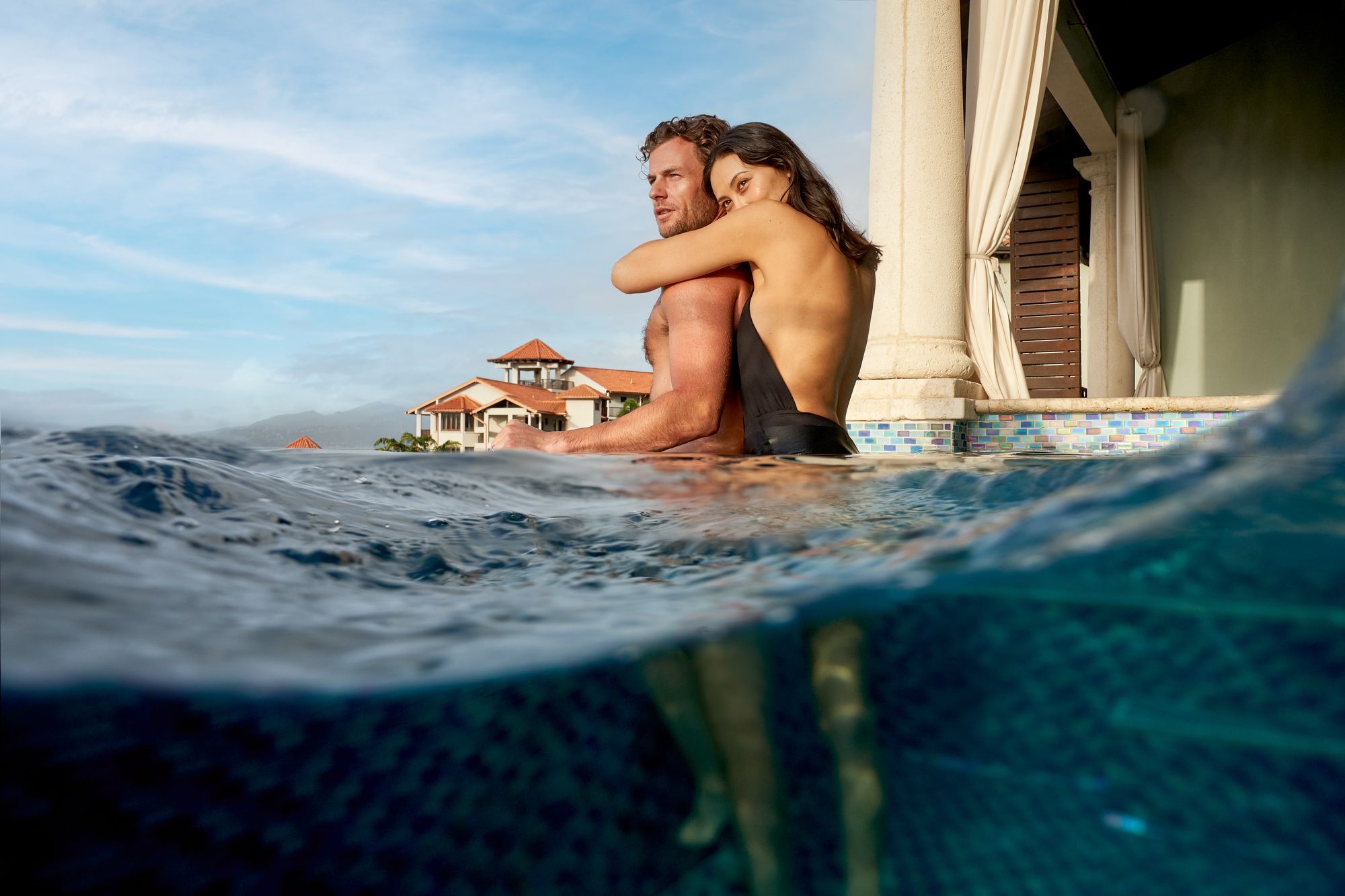 couple in sky pool at sandals grenada resort