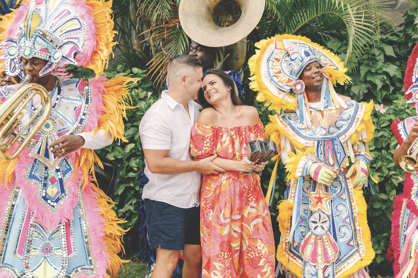 couple enjoying live junkanoo band performance