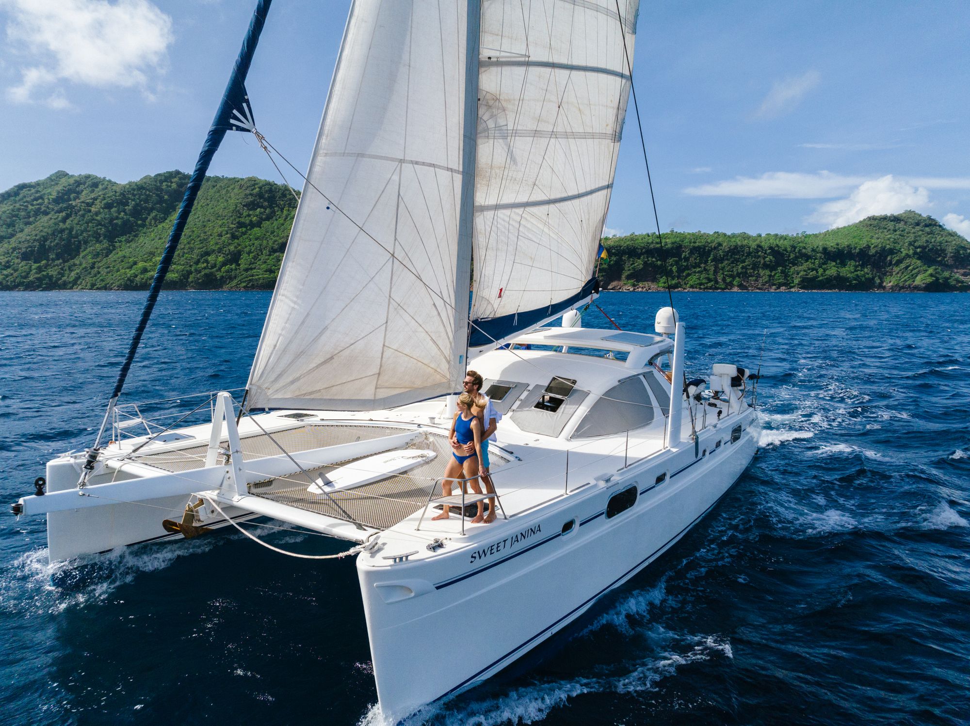 couple on white luxury yacht in the open sea