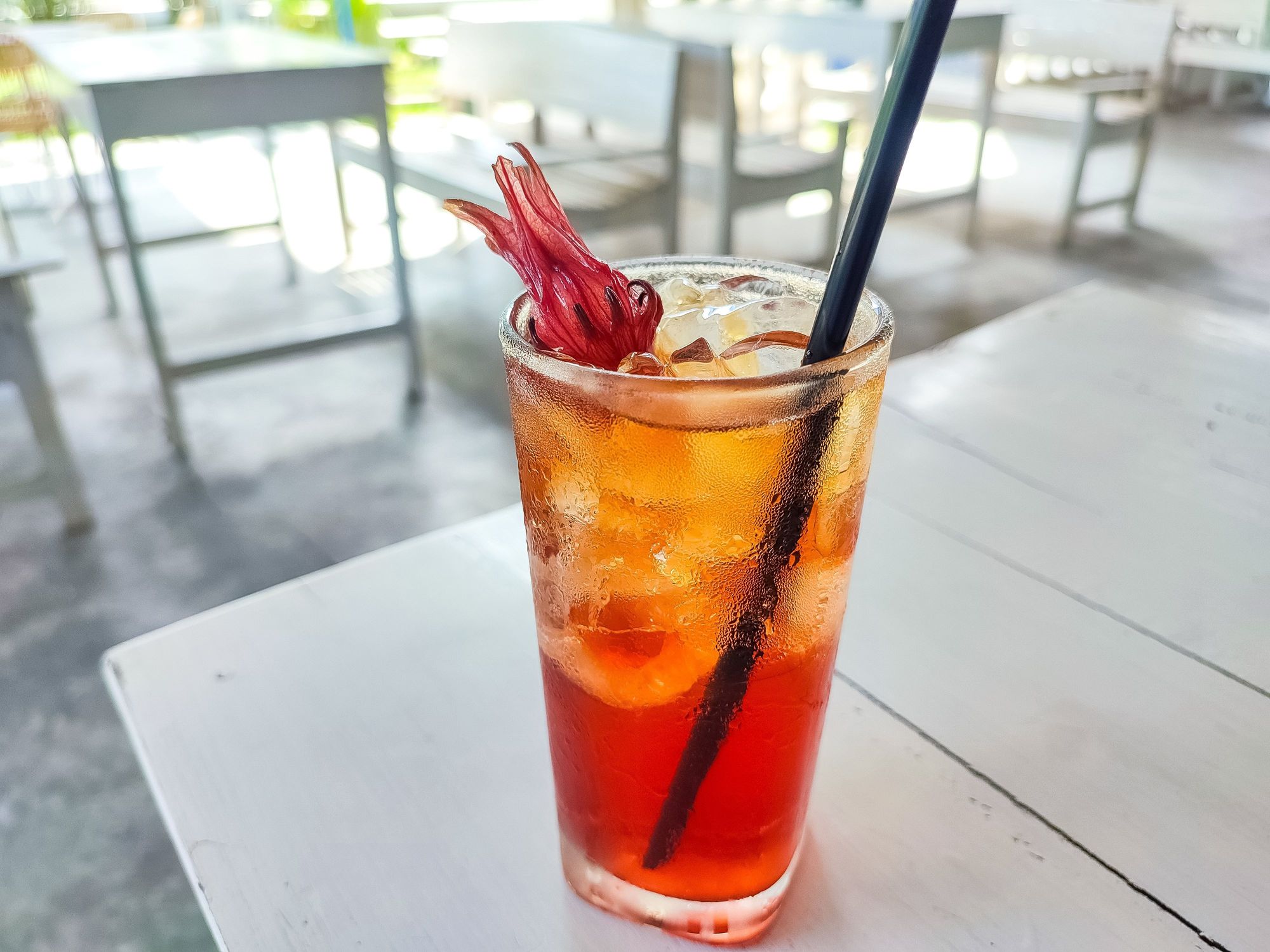 iced sorrel tea with straw