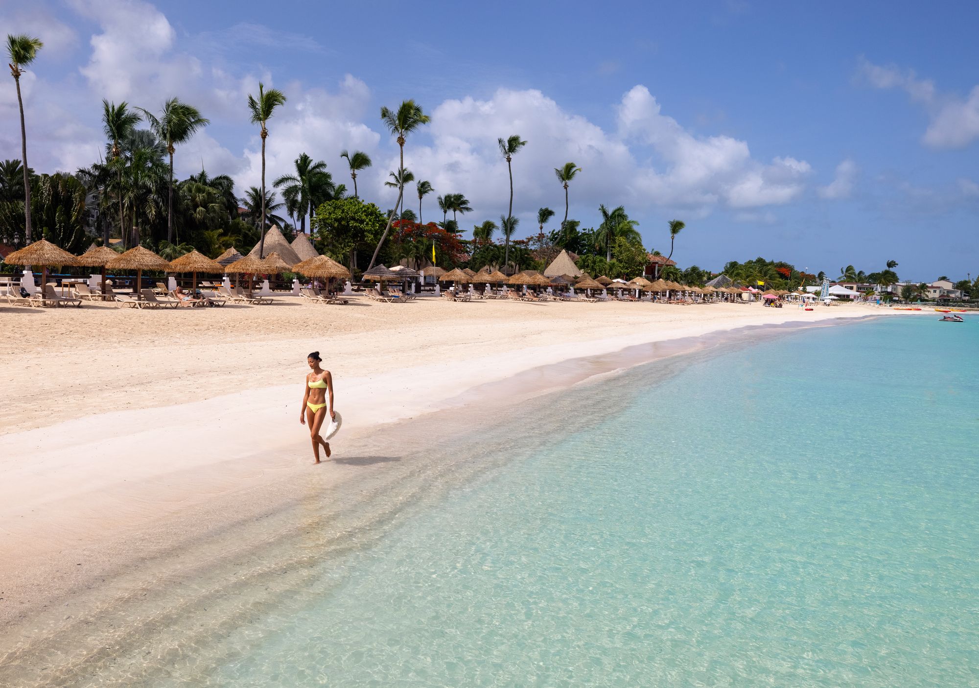 woman walking on beach