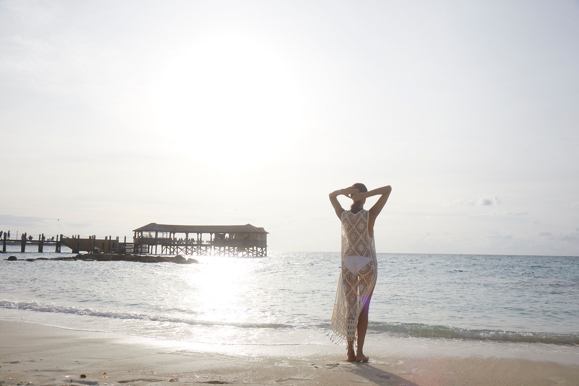 woman standing by ocean