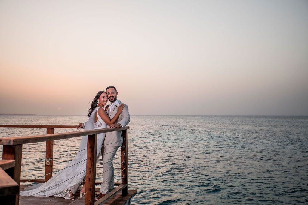 bride-groom-posing-overwater-dock-tyl-jes