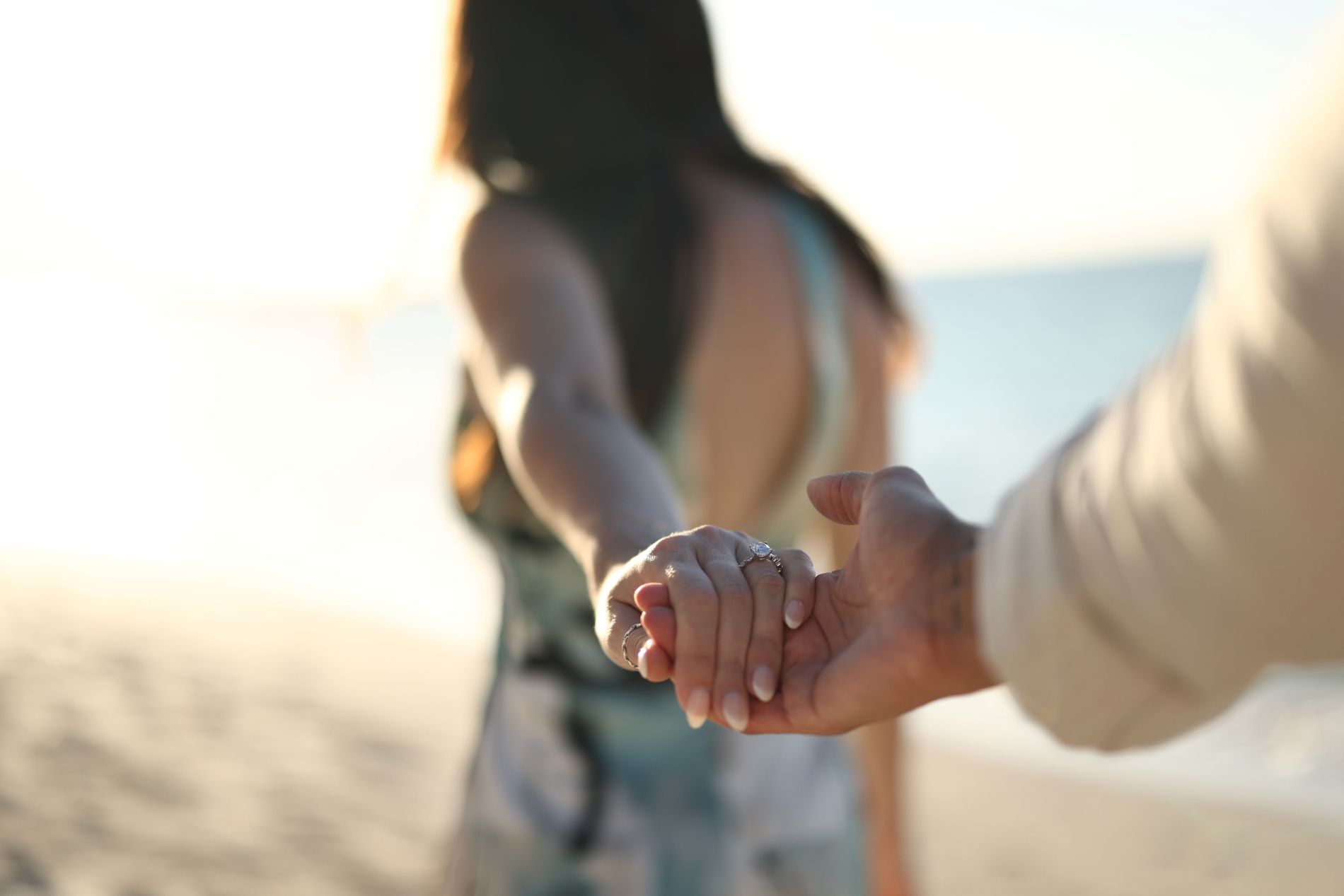 engaged-on-beach-ring-finger