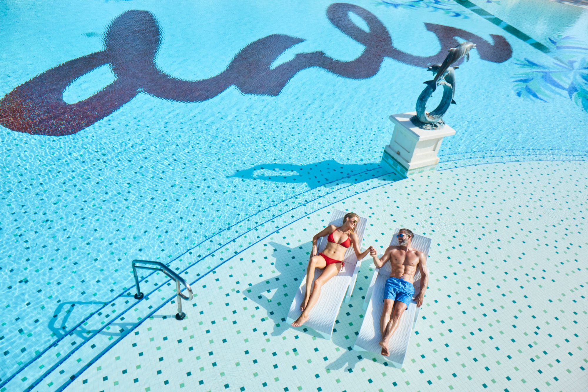 SAT-Lifestyle-Main-Pool-Couple-8