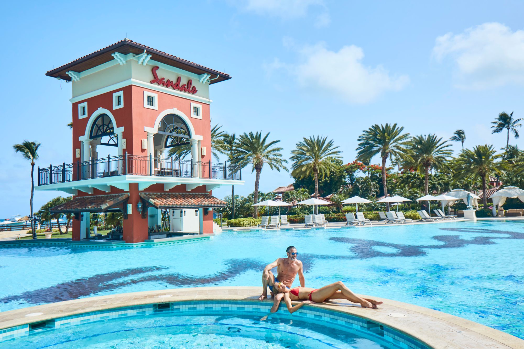 SAT-Lifestyle-Main-Pool-Whirlpool-Couple-2