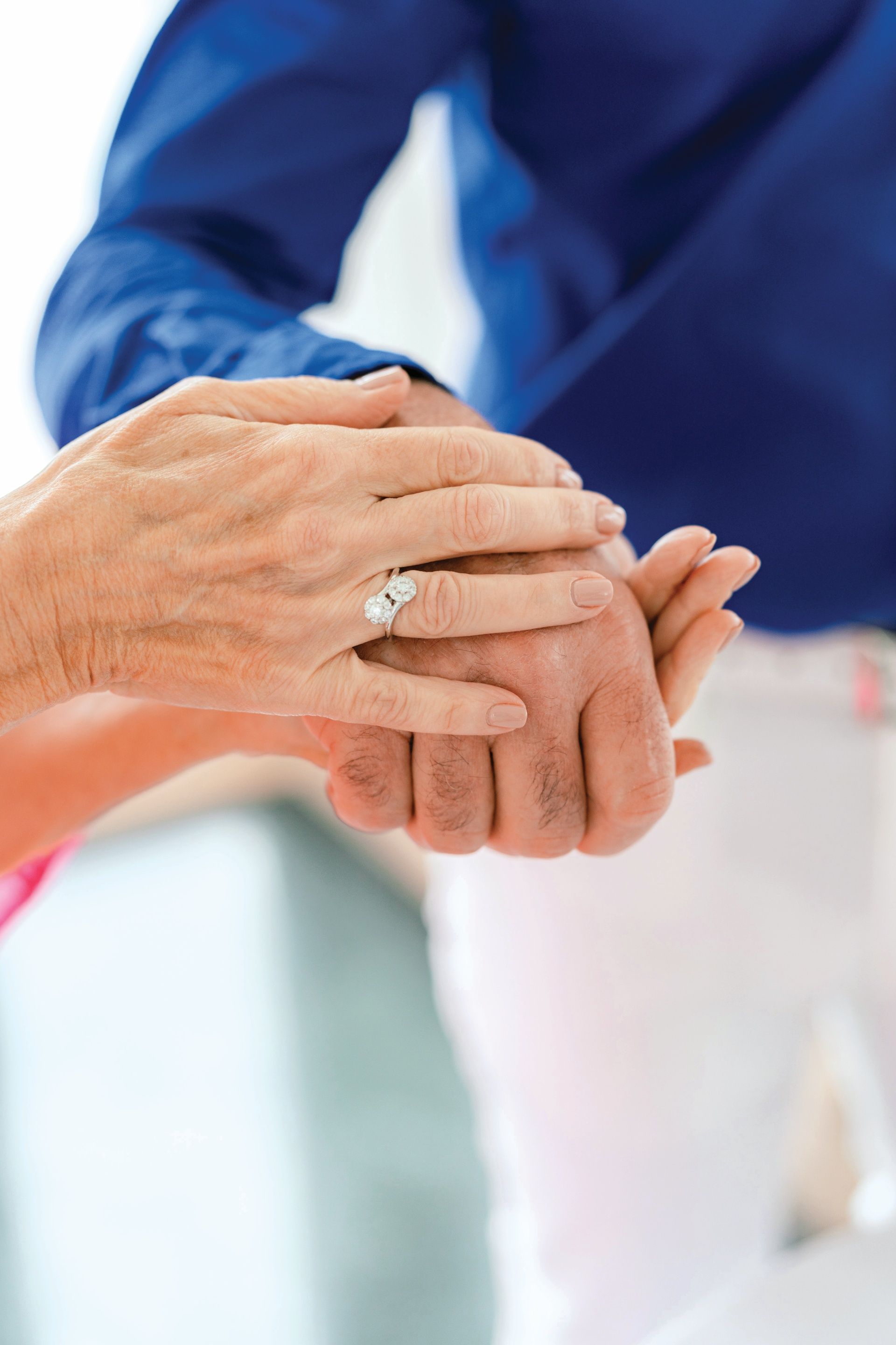 Close-up of wedding ring on hand symbolizing lasting commitment